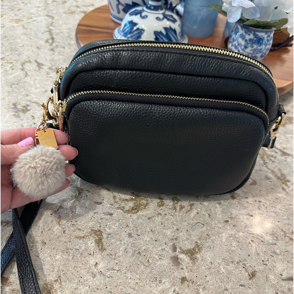 Pom pom London crossbody leather bag